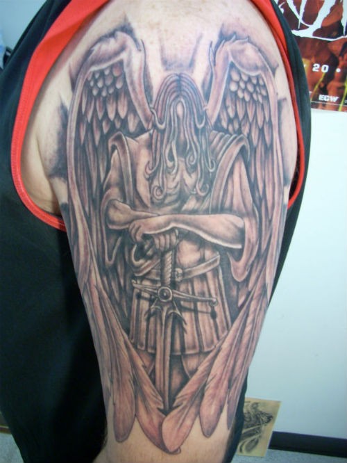 点击大图看下一张：上帝的使者，善良的化身：手臂上的天使纹身图3