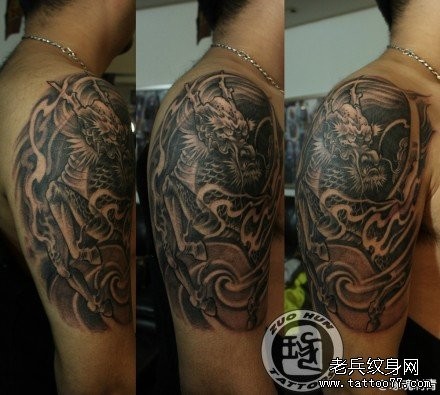 点击大图看下一张：手臂流行很酷的麒麟纹身图片