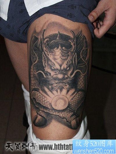 点击大图看下一张：腿部超帅流行的麒麟纹身图片
