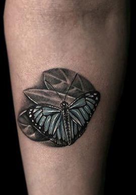 点击大图看下一张：3D纹身彩蝶树叶纹身图案