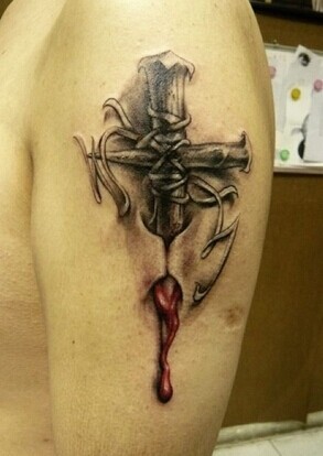 点击大图看下一张:胳膊时尚个性的十字架刺青图3