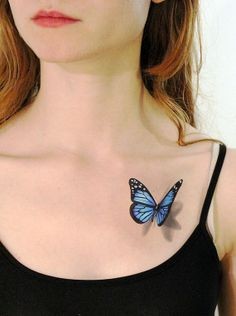 点击大图看下一张：美女胸部漂亮的蝴蝶纹身