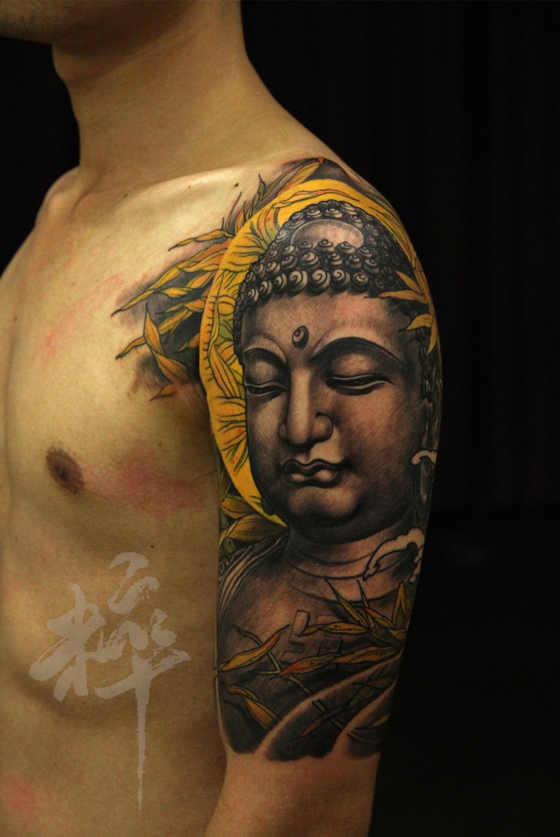 点击大图看下一张：超酷的佛头手臂纹身图2