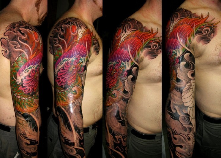 点击大图看下一张：男士手臂霸气的凤凰花臂纹身图案