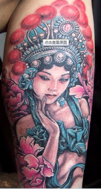 点击大图看下一张：女士手臂彩色花旦纹身图案