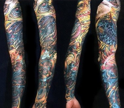 点击大图看下一张：一组霸气的彩色花臂纹身图案