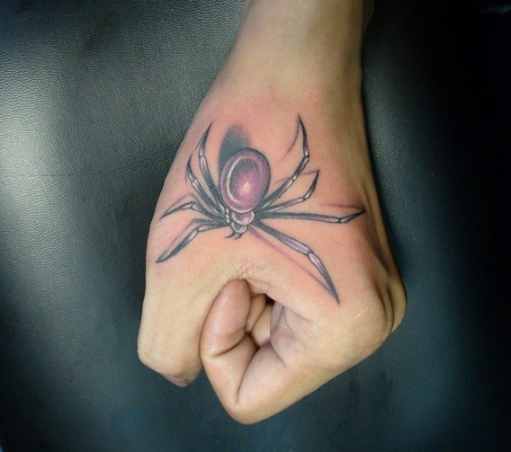 点击大图看下一张：手臂上漂亮的蜘蛛纹身图案