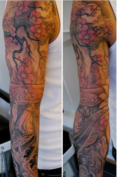 点击大图看下一张：适合男士的一款梅花花臂纹身图案
