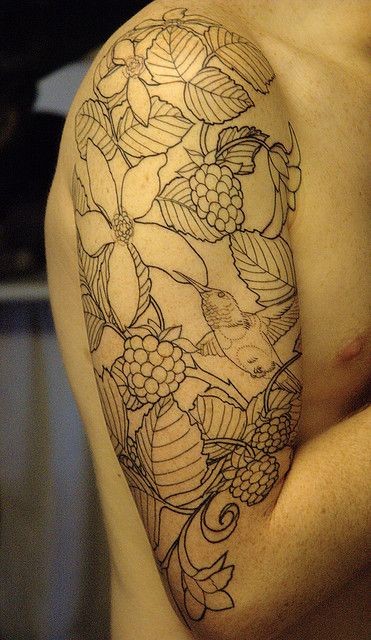 点击大图看下一张：手臂上一款素色花朵纹身