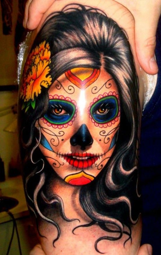 点击大图看下一张：大臂上一款个性女性头部纹身
