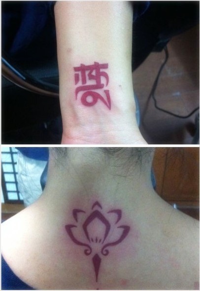 点击大图看下一张:女性颈部手臂图腾刺青