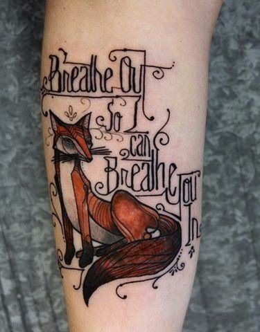 点击大图看下一张：手臂狐狸英文纹身