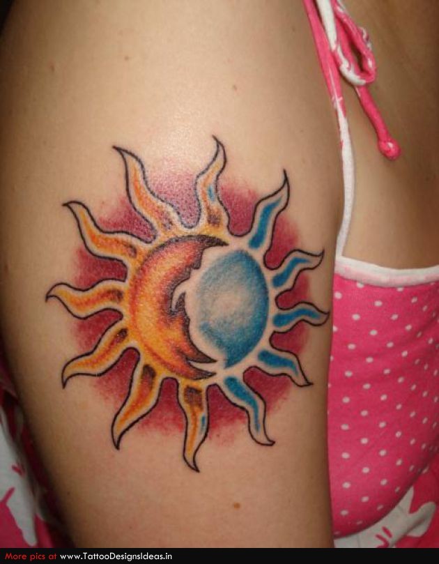 点击大图看下一张：女性手臂彩色太阳纹身
