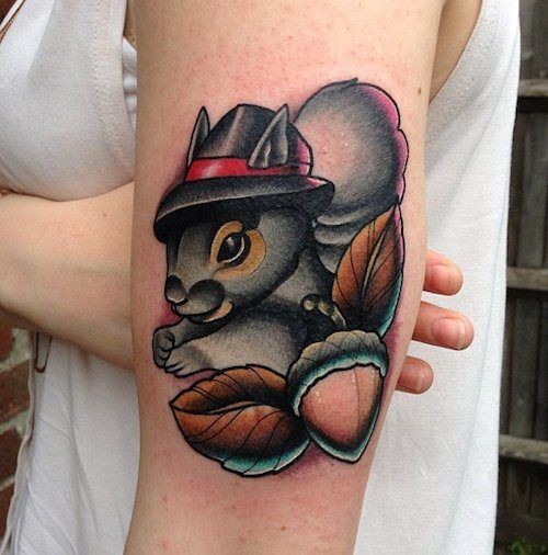 点击大图看下一张：手臂上可爱的小松鼠纹身