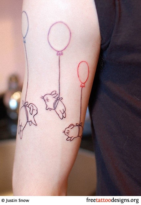 点击大图看下一张：女性手臂好看的小兔子气球纹身