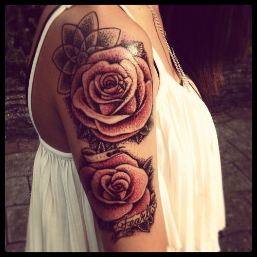 点击大图看下一张：能手臂漂亮的玫瑰纹身