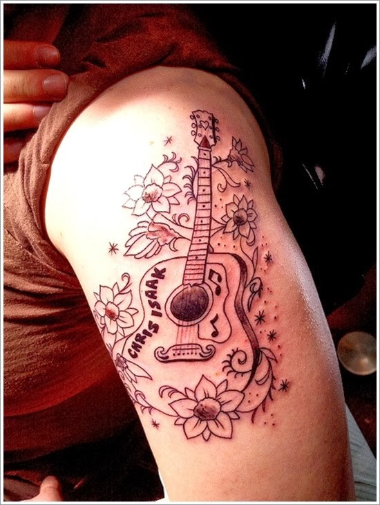 点击大图看下一张：手臂上非常漂亮唯美的吉他纹身