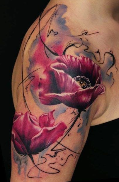 点击大图看下一张：手臂抽象的花朵纹身