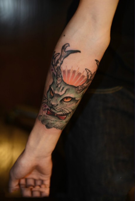 点击大图看下一张：创意麋鹿角猫手臂纹身图案