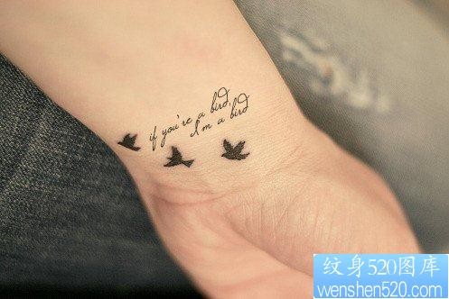 点击大图看下一张：图腾纹身图片：手臂图腾文字小鸟纹身图片纹身作品