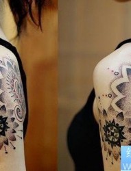 来自上海纹身图库打造的超酷大臂女人纹身图片图片