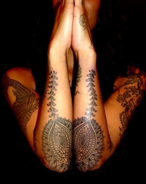 点击大图看下一张：女性手臂上漂亮的图腾纹身