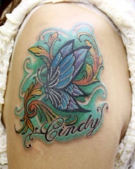 点击大图看下一张：手臂纹身图片：手臂彩色蝴蝶纹身图片纹身作品
