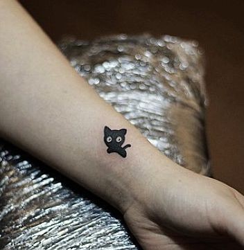 点击大图看下一张：手臂纹身图片：手臂可爱图腾猫咪纹身图片纹身作品