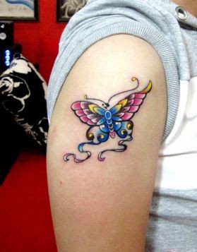 点击大图看下一张：女孩子手臂彩色蝴蝶纹身图片