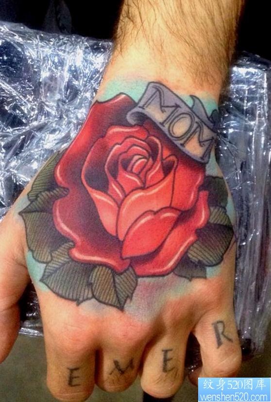 点击大图看下一张：手背上漂亮的玫瑰花纹身