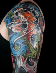 手臂彩色樱花鲤鱼纹身图片由纹身520图库推荐