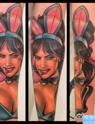 一幅手臂兔女郎纹身图片由纹身520图库推荐