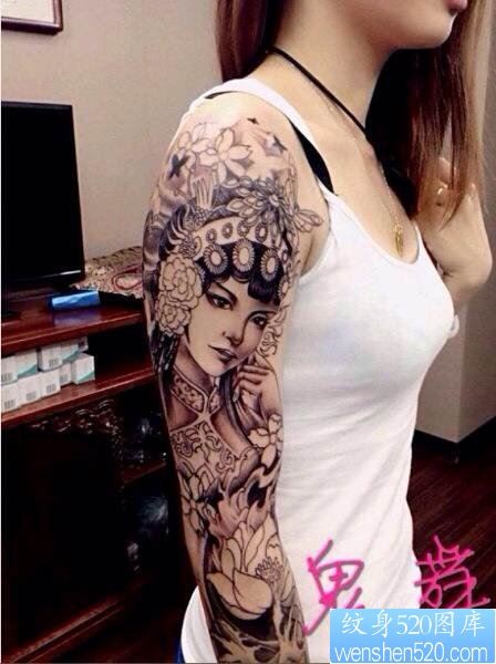 点击大图看下一张：一幅女人手臂花旦纹身图片由纹身520图库推荐