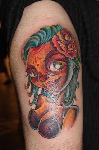 点击大图看下一张：大臂上一款卡通女鬼纹身