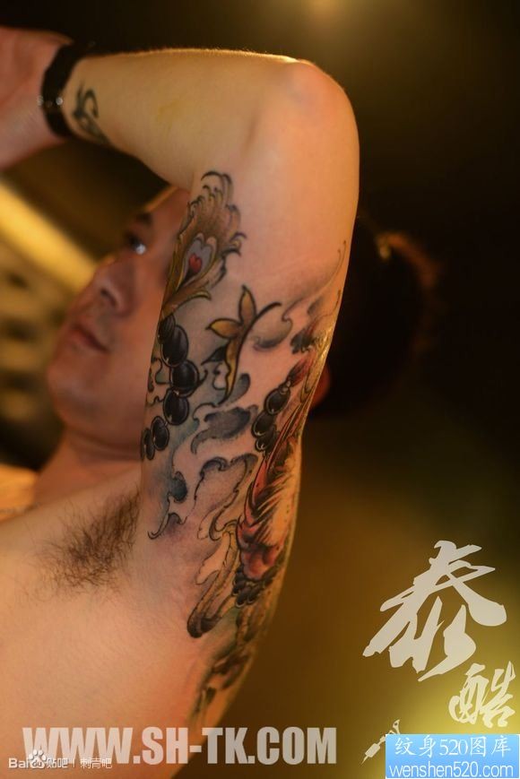 点击大图看下一张：胳膊凤凰佛珠（4）纹身图片
