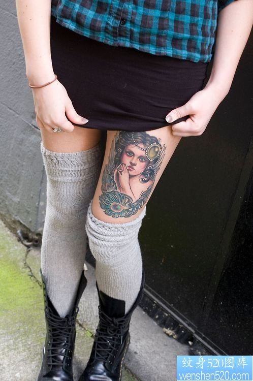 点击大图看下一张：腿部女郎纹身作品