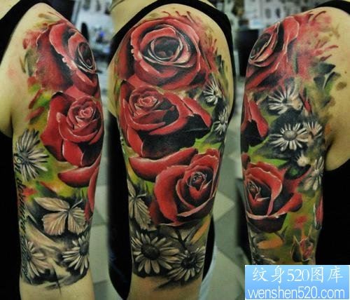 点击大图看下一张：一幅胳膊彩色玫瑰花纹身作品