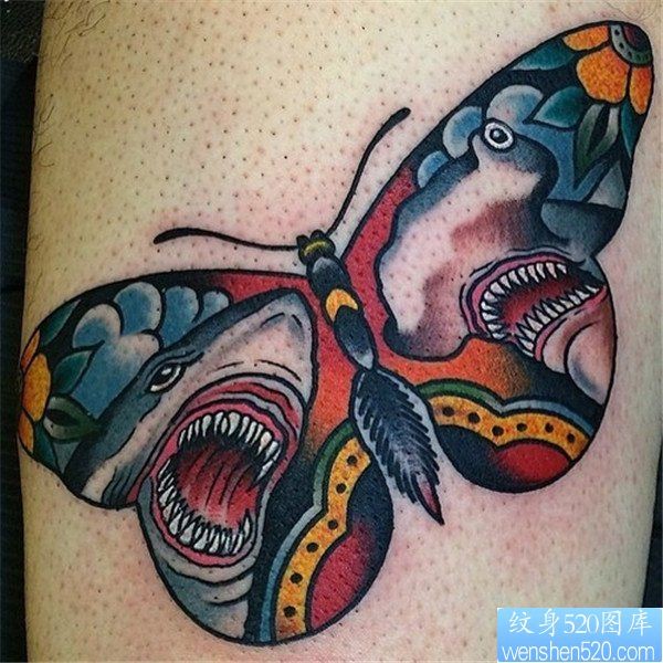 点击大图看下一张：一幅手臂彩色蝴蝶纹身作品