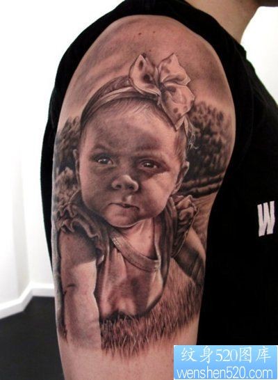 点击大图看下一张：手臂小孩肖像纹身图案