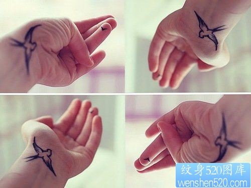 点击大图看下一张：一款小清新手腕燕子纹身
