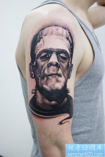 点击大图看下一张：一款手臂黑灰人物肖像纹身图案