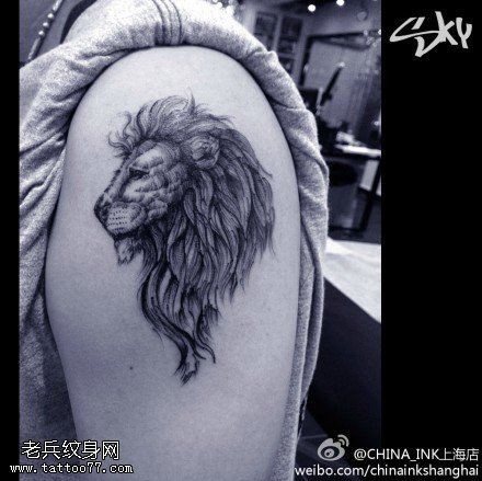 点击大图看下一张：一款手臂狮子头纹身图案