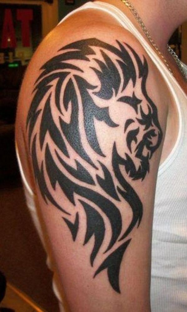 点击大图看下一张：大臂上帅气的狮子图腾纹身图2