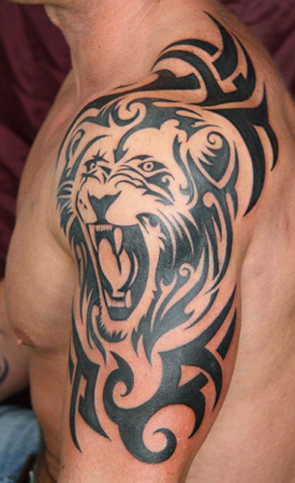 点击大图看下一张：大臂上帅气的狮子图腾纹身图3