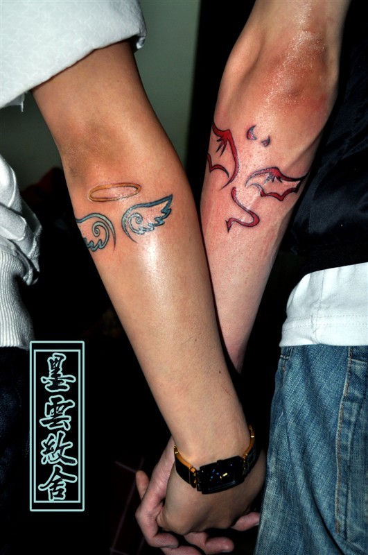 点击大图看下一张：情侣手臂恶魔和天使图腾纹身