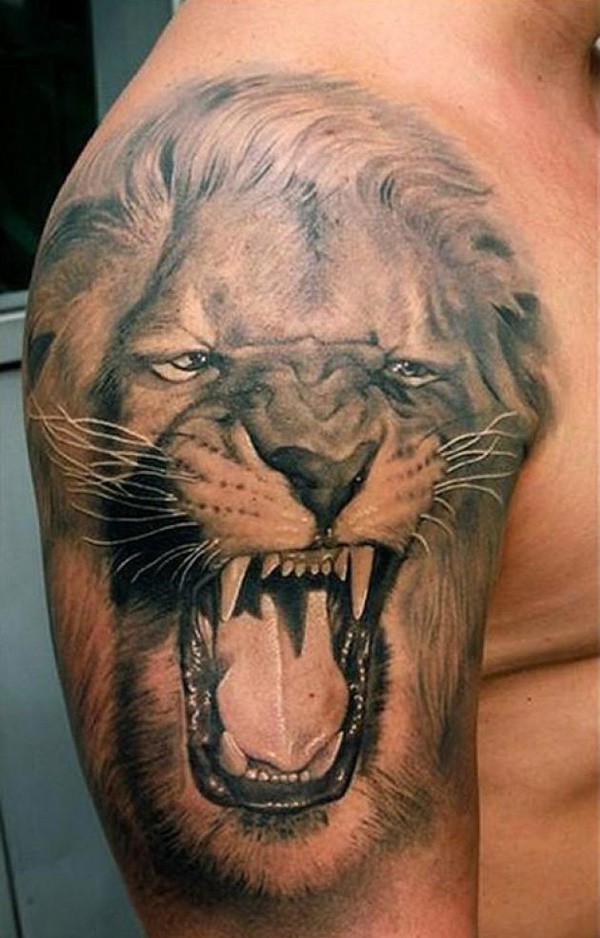 点击大图看下一张：凶猛的动物  狮子纹身