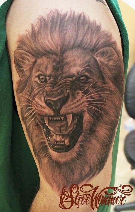 点击大图看下一张：凶猛的动物  狮子纹身图2