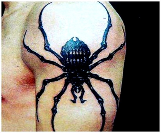 点击大图看下一张：大臂上的蜘蛛纹身图3