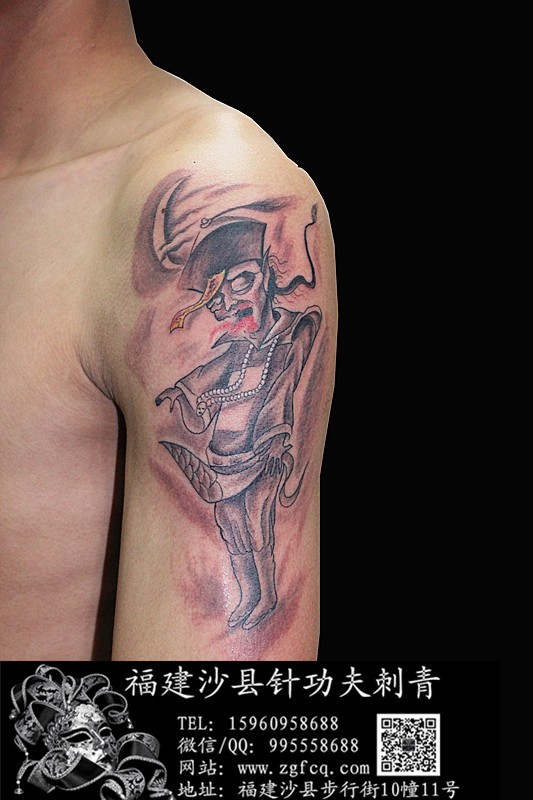 点击大图看下一张：大臂上个性僵尸纹身