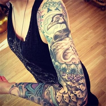 点击大图看下一张：瑞士 Rob Kass的花臂纹身作品